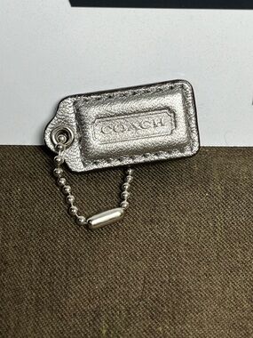 Coach Silver Metallic 1.5” Leather Hangtag